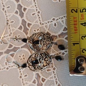 Silver toned and black pierced earrings